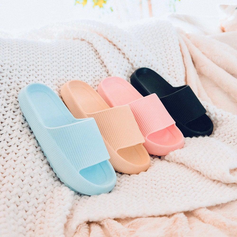 Men's mixed color slides on blanket